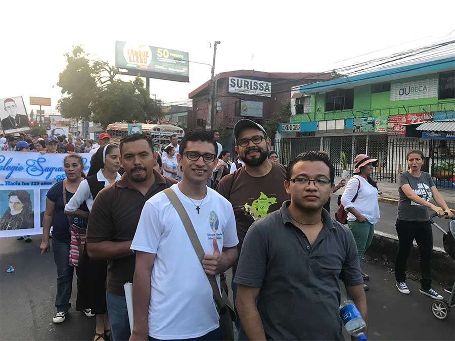 Carmelite Students processing to the Cathedral on the 38th anniversary of the death of Blessed Oscar Romero. A crowd of several thousand joined the current archbishop of San Salvador, Mons. José Luis Escobar, for a festive Mass in honor of Romero.